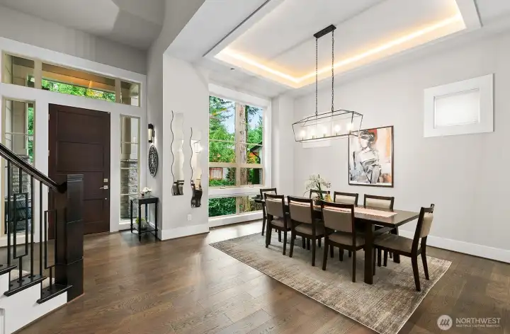 Formal dining room off the entry with grand picture window.
