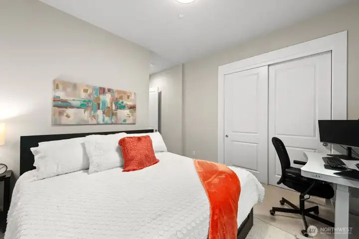 En-suite on the main level with attached 3/4 bath.