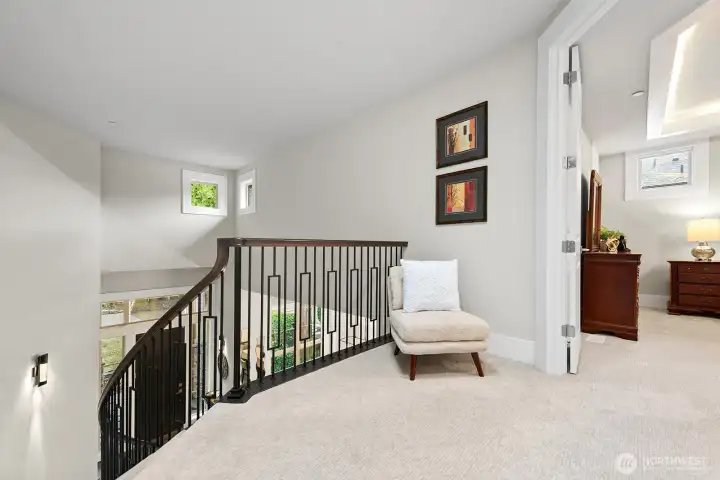 Upper level landing. Stairs and upper level feature high-end Mohawk carpet.