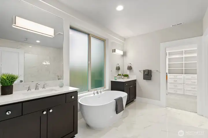 Luxurious primary bathroom equipped with complete Bidet toilet system.