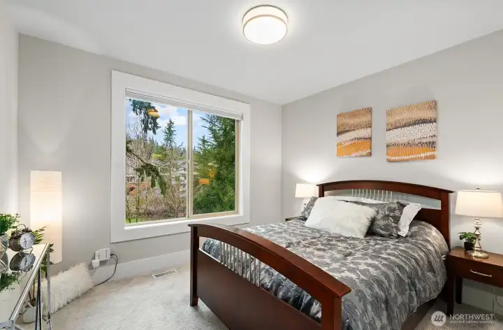 One of 4 bedrooms on the upper level. This bedroom is an en-suite with a full bathroom.