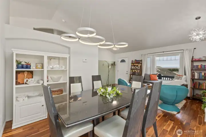 Formal dining room is open to the formal living room and connected to the kitchen.