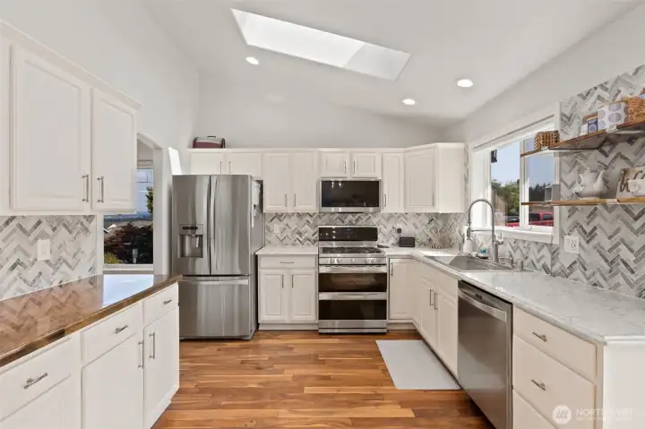 Be sure to catch the vaulted ceiling and skylight.