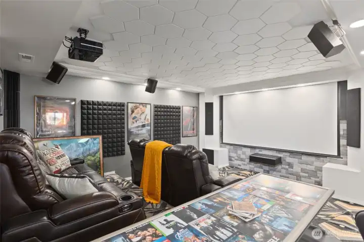 AV equipment conveys with the house.  Movie screen can be raised electronically.