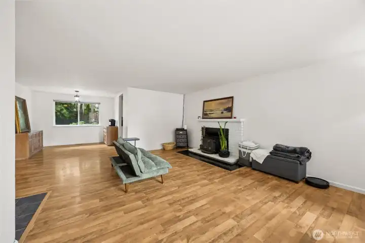 Enter in to open and airy living room and dining room with easy care laminate flooring and fresh interior paint.