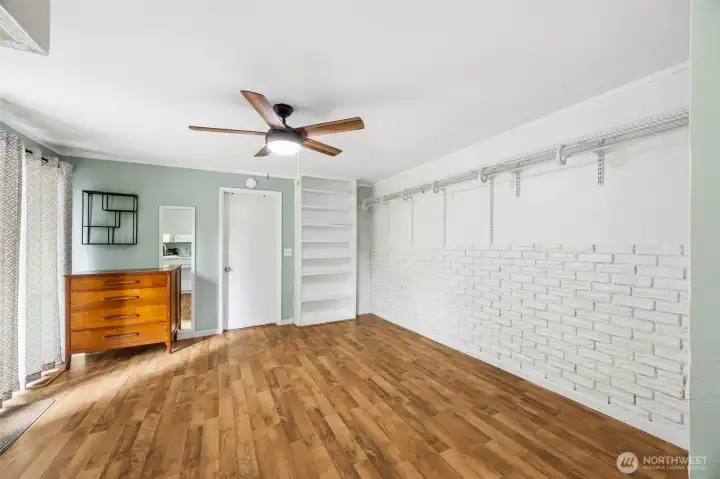 Second living space has a slider out to the backyard. Wait until you see just how big that yard is!