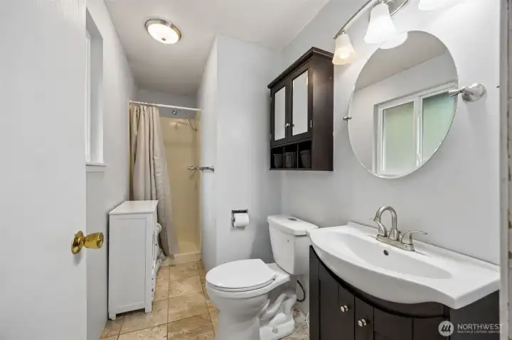 Primary en suite bath with a shower.