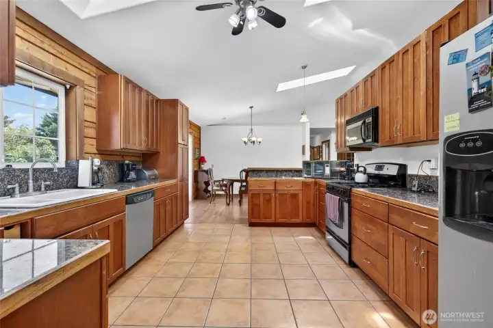 Kitchen leading to the dining room. Kitchen leading to the dining room.