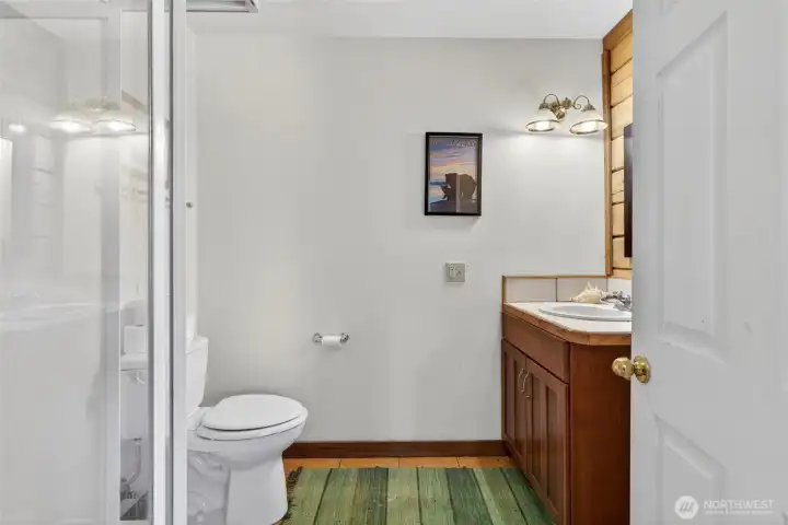 Bathroom off the utility room is easily accessible when you come through the bonus room or the deck entrance. Bathroom off the utility room is easily accessible when you come through the bonus room or the deck entrance.