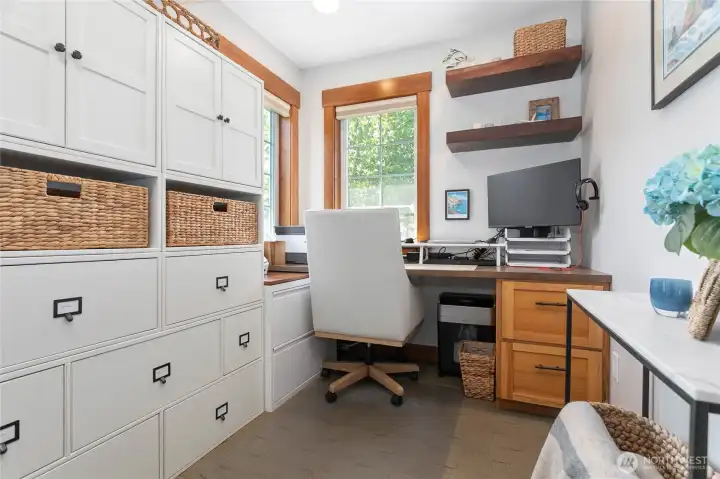 As you come through the front entry this office is located directly to the right.