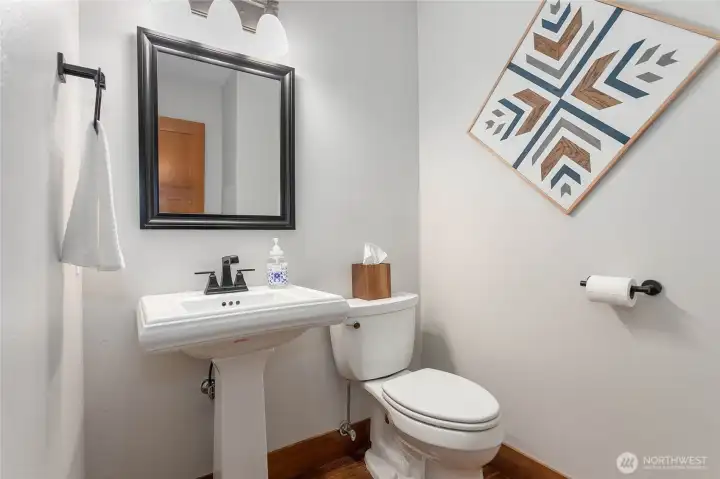 Downstairs half bath for guests.
