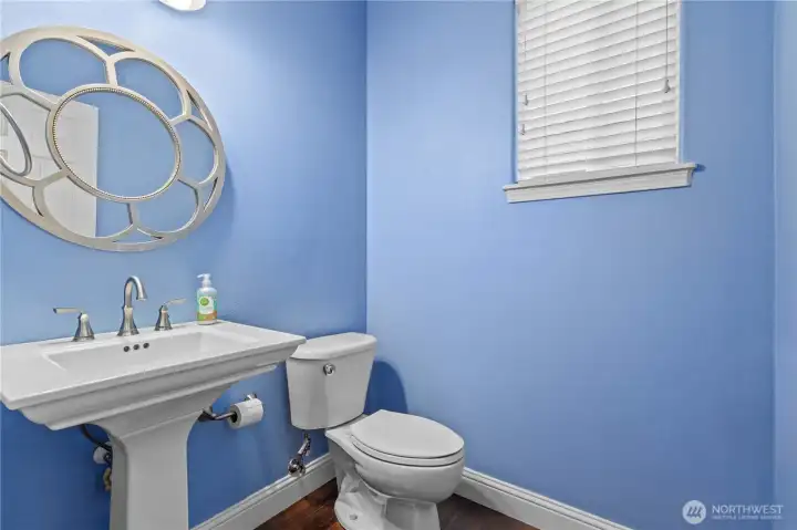 Conveniently located main-floor half bath situated just off the kitchen and nestled right next to two spacious storage closets for ultimate functionality Conveniently located main-floor half bath situated just off the kitchen and nestled right next to two spacious storage closets for ultimate functionality
