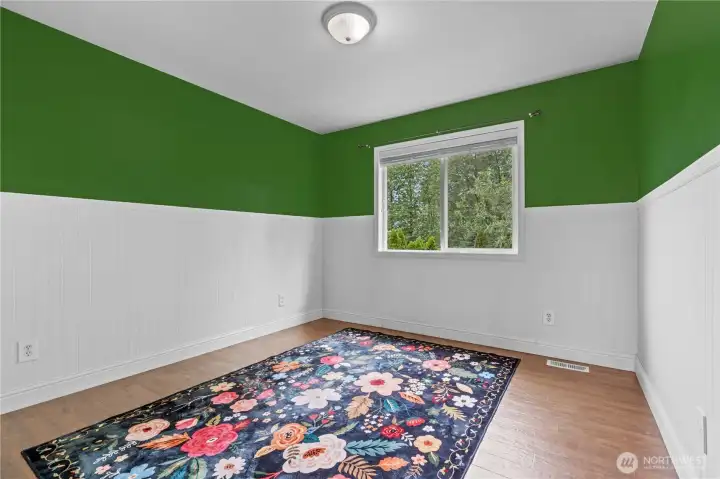 Bright and cheerful third bedroom featuring a generous layout, great natural ligh Bright and cheerful third bedroom featuring a generous layout, great natural ligh