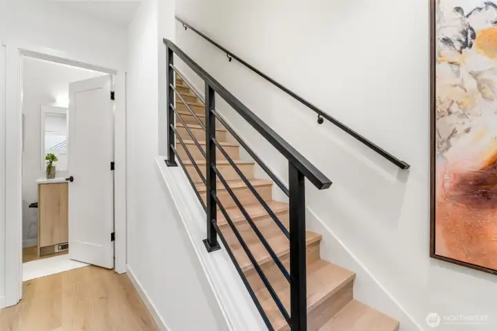 Partially Open Staircase with Custom Metal Railings Partially Open Staircase with Custom Metal Railings