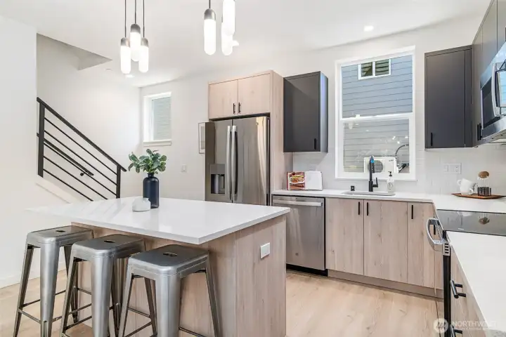 Large, Gourmet Kitchen with Sleek Modern Cabinets Large, Gourmet Kitchen with Sleek Modern Cabinets