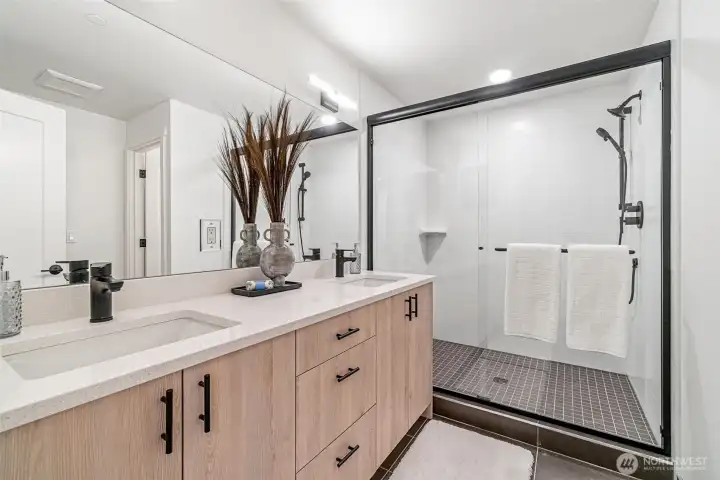 Luxury Private Suite Bath with Double Sinks and Big Shower with Stone Floor and Handheld Luxury Private Suite Bath with Double Sinks and Big Shower with Stone Floor and Handheld