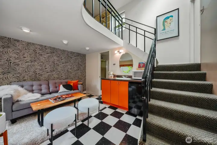 This two-story cottage features a welcoming living room and a convenient 3/4 bath.