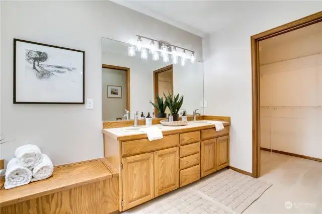 Primary bath has a large walk in closet and separate water closet.