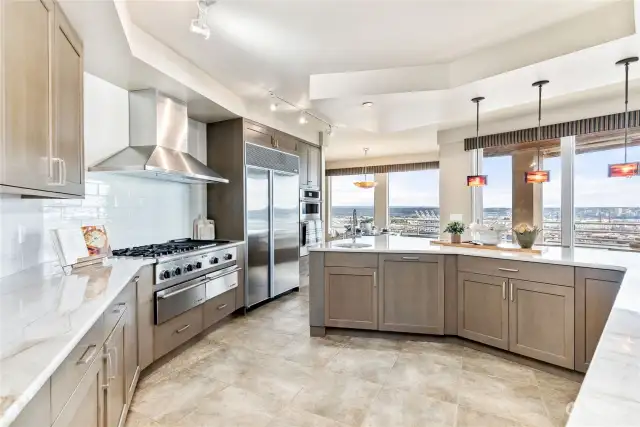 Chef's kitchen with additional prep sink, high-end appliances & heated floors!