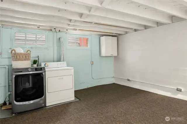 Lower level laundry area right off entry to garage.