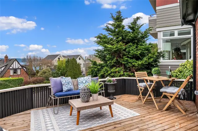 Spacious front deck will be the popular choice for enoying Seattle summer days.