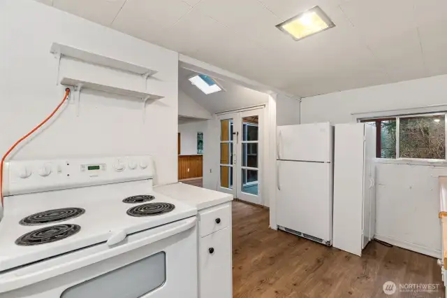 french doors to small covered deck