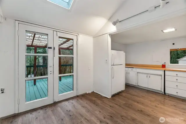 french doors to small covered deck
