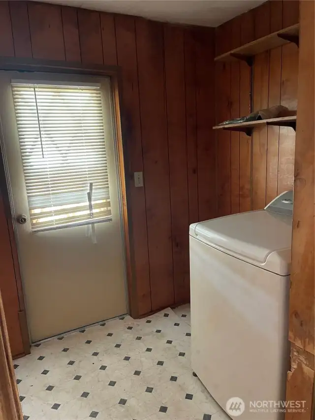 Entry from the carport to the kitchen.