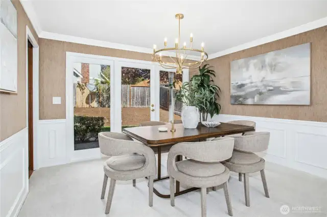 All new lighting has been installed throughout this home. Step through the glass door to a second patio.