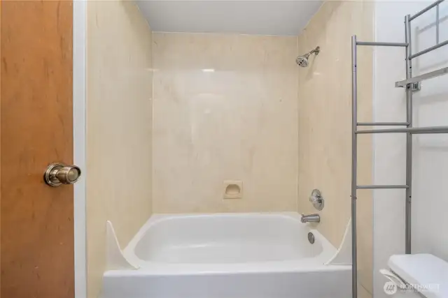 Close up of the primary bath with tub/shower combo.