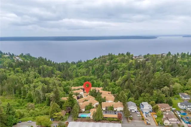 This home is nestled in a quiet, tree-lined enclave that feels worlds away, yet is just minutes to shopping, dining, parks, freeways, Downtown Seattle, and Sea-Tac Airport.