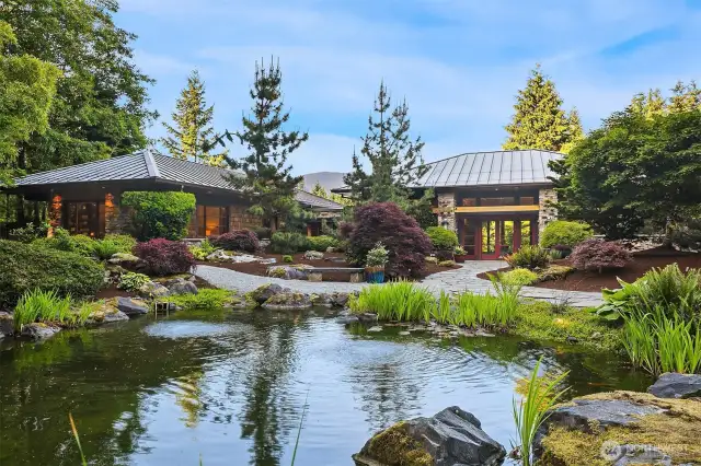 Inspired by Frank Lloyd Wright Falling Water and Taliesin this custom home is the perfect blend of PNW and Japenese zen garden