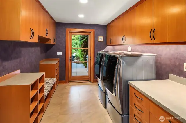 Laudry with utility sink and door to the patio - drop those muddy clothes here.
