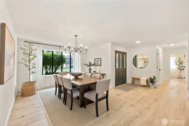 Spacious Dining Area Comfortably Hosts 2-12! Timeless Black Framed Windows Provide Abundant Natural Light!
