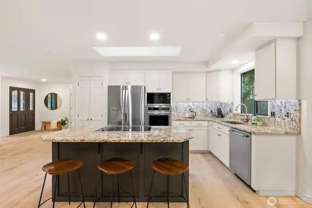 Slab Granite, New SS Appliances, Breakfast Island, Undermount Lighting, & Abundant Cabinetry!