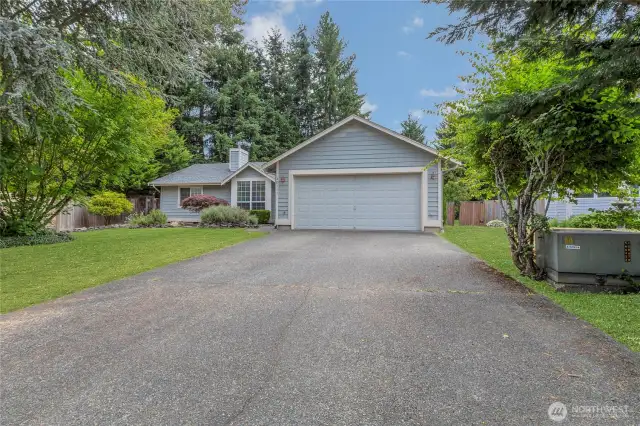 Welcome home to your nicely landscaped front yard