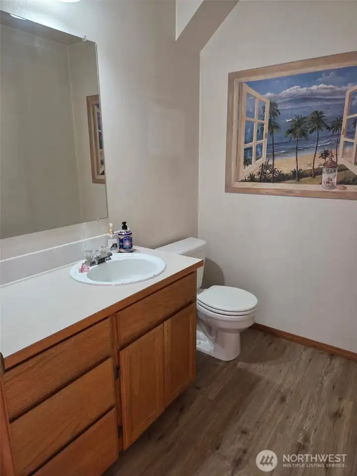 Powder bath with custom wall painting & NEW Floors!