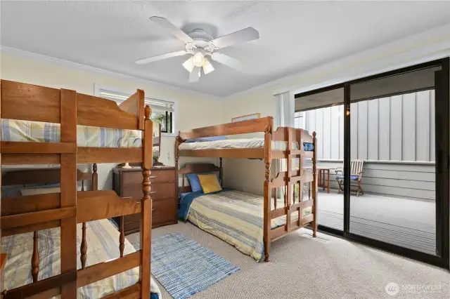 3rd bedroom or office space with slider to porch