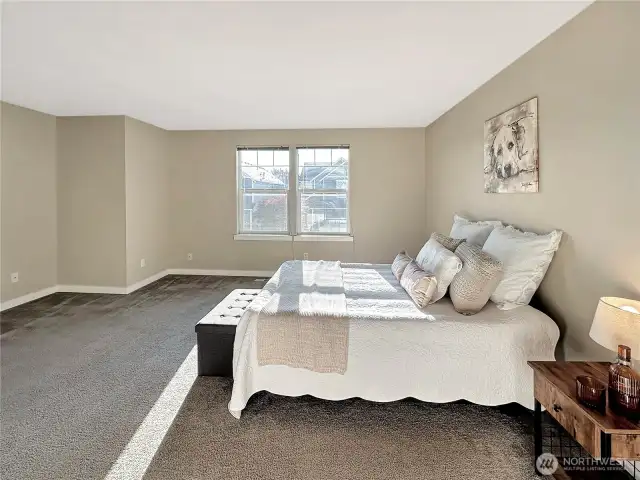 Primary bedroom with queen sized bed