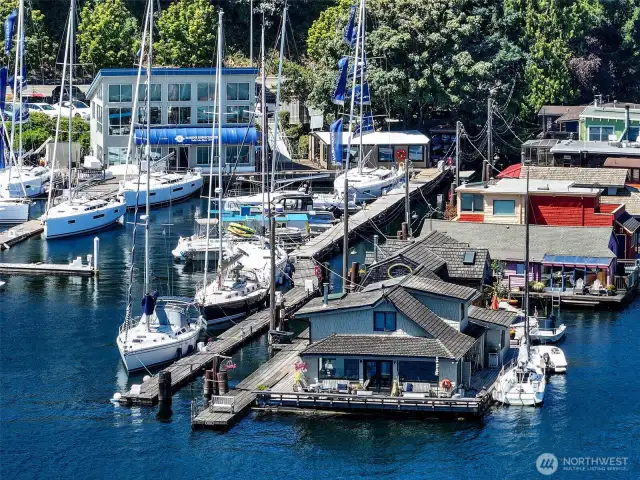 A few slips away, the marina is home to the famed “Sleepless in Seattle” houseboat, adding a touch of cinematic history to this vibrant Westlake waterfront community.