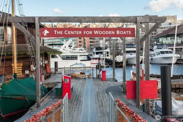 A short stroll brings you to The Center for Wooden Boats, where maritime heritage comes alive through hands-on exhibits, boat rentals, and one of Seattle’s most scenic waterfront parks.