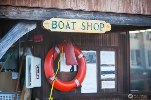 A working boat shop is just steps away, offering gear, repairs, and maritime know-how — part of the hands-on boating culture surrounding the S.S. Guppy.