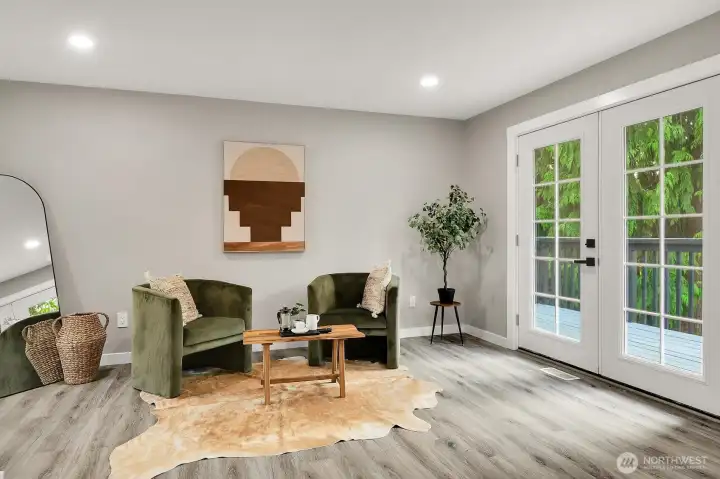 Main Level Primary w/ french doors to deck