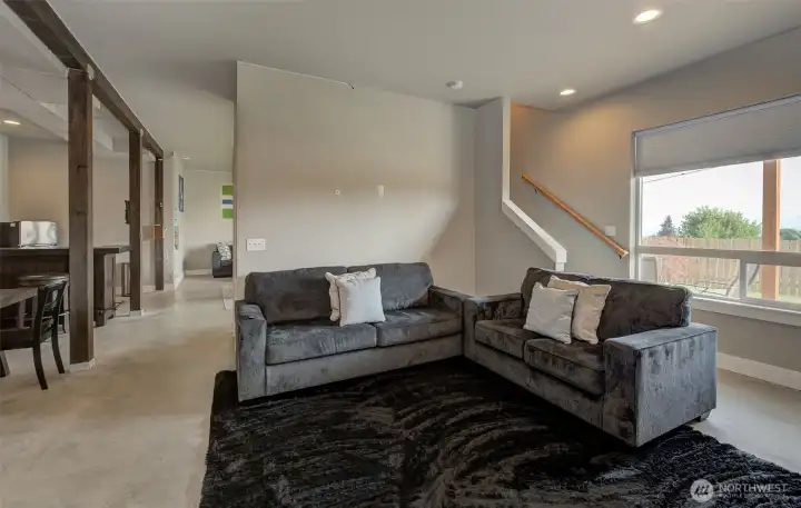 Family/ Recreation rooms.  Could be more bedrooms if you wanted.  Or separate living quarter.
