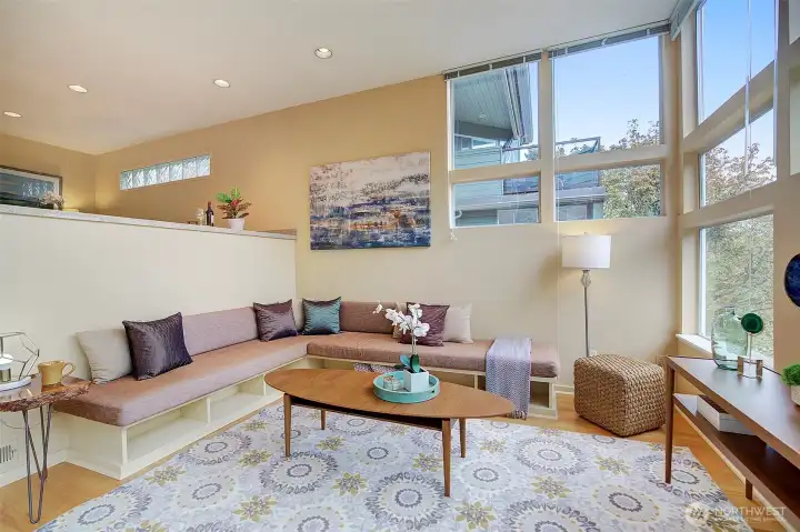 Wall of windows and open floor plan.