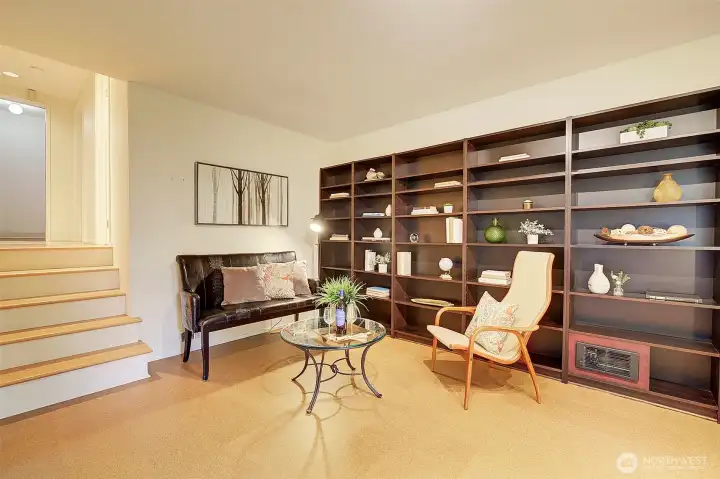 Lower level family room is a perfect place for games & movie night.