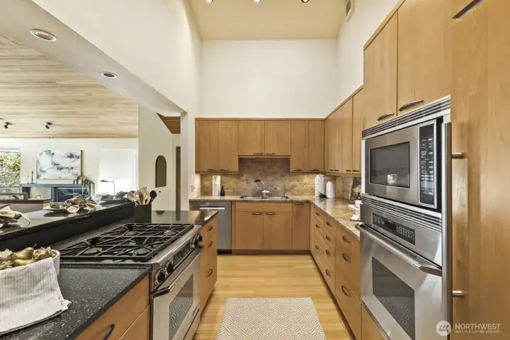 Large skylight and vaulted ceilings open to incredible lake views