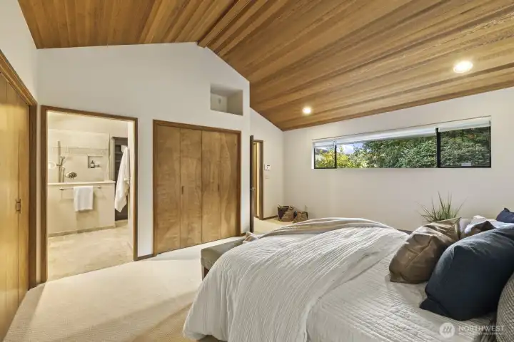 Primary with 3 double closets and adjacent bath