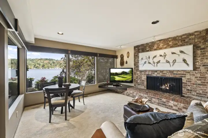 Rec room features gorgeous lake views, wet bar and fireplace