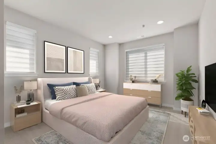 Virtual staging.  Top floor primary bedroom with large windows and huge walk in closet with built-in closet system.